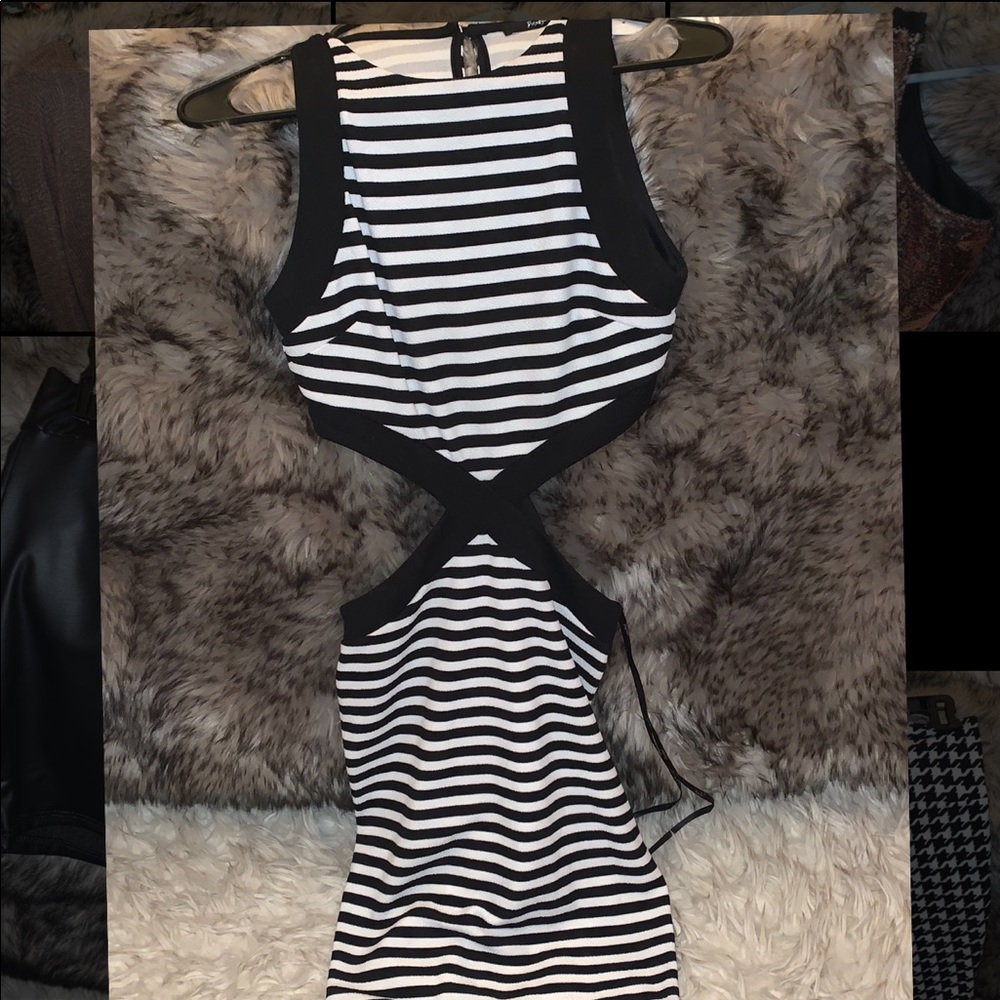 Black and white cut out midi dress. NEVER WORN!